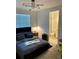 Main bedroom with ensuite bathroom and stylish decor at 3101 Hollow Hickory Pl, Wesley Chapel, FL 33543