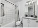 Clean bathroom with shower/tub combo and vanity at 3101 Hollow Hickory Pl, Wesley Chapel, FL 33543