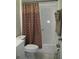 Bathroom with shower/tub combination and neutral tile at 4469 Keyes Ave, Spring Hill, FL 34606