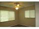 Bedroom with ceiling fan, neutral paint, and carpet at 4469 Keyes Ave, Spring Hill, FL 34606