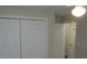 Bedroom with closet and door leading to another room at 4469 Keyes Ave, Spring Hill, FL 34606