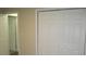 Bedroom with closet and view of doorway at 4469 Keyes Ave, Spring Hill, FL 34606