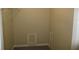 Walk-in closet featuring shelving and a crawl space perfect for storage or organization at 4469 Keyes Ave, Spring Hill, FL 34606