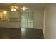 Open concept living area flows into the updated kitchen, perfect for modern living and entertaining at 4469 Keyes Ave, Spring Hill, FL 34606