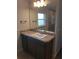 Bathroom with vanity, large mirror, and walk-in shower at 12162 Frankwood Rd, Brooksville, FL 34614