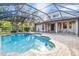 Spacious pool and patio with screened enclosure and home view at 19617 Sunset Bay Dr, Land O Lakes, FL 34638