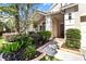 House exterior with landscaping and walkway at 19617 Sunset Bay Dr, Land O Lakes, FL 34638