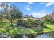 Home with screened patio overlooking a canal at 19617 Sunset Bay Dr, Land O Lakes, FL 34638