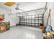 Spacious garage with overhead storage and ample room for parking at 19617 Sunset Bay Dr, Land O Lakes, FL 34638