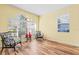 Cozy sitting area with two armchairs and a wood floor at 19617 Sunset Bay Dr, Land O Lakes, FL 34638