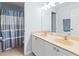 Bathroom with double vanity and shower/tub combo at 19617 Sunset Bay Dr, Land O Lakes, FL 34638