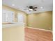 Upstairs bedroom with wood flooring and ceiling fan at 19617 Sunset Bay Dr, Land O Lakes, FL 34638
