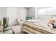 Cozy bedroom with window and neutral decor at 19617 Sunset Bay Dr, Land O Lakes, FL 34638