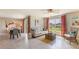 Relaxing living room with water views and patio access at 8213 County Line Rd, Spring Hill, FL 34606
