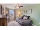 Bedroom with a daybed, window seat and dresser at 30979 Wild Juniper Ct, Brooksville, FL 34602