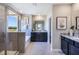 Bathroom with double vanity and soaking tub at 7437 Rome Ln, Brooksville, FL 34613