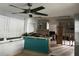 An open dining area with a view into the kitchen at 431 80Th Way, St Pete Beach, FL 33706
