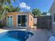 Relaxing pool area with a private cabana at 431 80Th Way, St Pete Beach, FL 33706