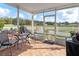 Enjoy relaxing in this screened patio with plenty of space for outdoor furniture at 14713 Wake Robin Dr, Brooksville, FL 34604