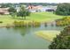 Home situated on golf course by lake at 13744 Carryback Dr, Dade City, FL 33525