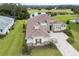 Luxury home with tile roof, stone accents and a large lot at 13744 Carryback Dr, Dade City, FL 33525