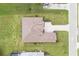Bird's eye view of house, driveway and surrounding landscape at 13744 Carryback Dr, Dade City, FL 33525