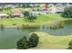 Property located on golf course with lake views at 13744 Carryback Dr, Dade City, FL 33525