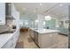 Open concept kitchen with island and breakfast nook at 13744 Carryback Dr, Dade City, FL 33525