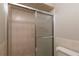 Clean bathroom with a shower and tile flooring at 15123 Copeland Way, Spring Hill, FL 34604