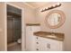 Main bathroom with granite countertop and a walk-in shower at 15123 Copeland Way, Spring Hill, FL 34604