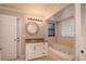 Bathroom with granite vanity, a jetted tub, and a walk-in shower at 15123 Copeland Way, Spring Hill, FL 34604