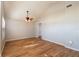 Spacious bedroom with wood-look floors at 15123 Copeland Way, Spring Hill, FL 34604