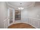 Cozy dining area with wood flooring and french doors leading to the outside at 15123 Copeland Way, Spring Hill, FL 34604
