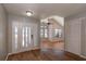 Bright entryway with wood-look floors at 15123 Copeland Way, Spring Hill, FL 34604