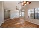 Sunlit living room with hardwood floors at 15123 Copeland Way, Spring Hill, FL 34604