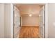Bright living room with hardwood floors and access to a patio at 15123 Copeland Way, Spring Hill, FL 34604