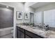 Bathroom with double vanity and granite countertop at 7479 Rome Ln, Brooksville, FL 34613