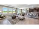 Open living space with a sectional sofa and kitchen views at 7479 Rome Ln, Brooksville, FL 34613