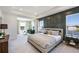 Main bedroom with sitting area and water views at 7479 Rome Ln, Brooksville, FL 34613