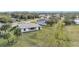 Aerial view of a house and surrounding neighborhood at 49 Marajo St, Punta Gorda, FL 33983