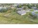 Aerial view showing a single-Gathering home and its large lot at 49 Marajo St, Punta Gorda, FL 33983