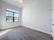 Bedroom with large window and ceiling fan at 49 Marajo St, Punta Gorda, FL 33983