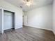 Spacious bedroom with a large closet and wood-look flooring at 49 Marajo St, Punta Gorda, FL 33983
