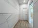 Large walk-in closet with wire shelving and extra storage at 49 Marajo St, Punta Gorda, FL 33983