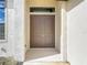 Double front doors with a transom window above at 49 Marajo St, Punta Gorda, FL 33983