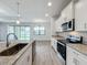 Kitchen with granite countertops and stainless steel appliances at 49 Marajo St, Punta Gorda, FL 33983