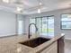 Kitchen island with granite countertop and modern sink at 49 Marajo St, Punta Gorda, FL 33983