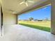Covered patio with ceiling fans, offering backyard views at 49 Marajo St, Punta Gorda, FL 33983