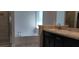 Bathroom featuring a soaking tub, shower, and a vanity with double sinks at 13221 Gulf Bay Ln, Spring Hill, FL 34609