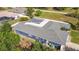 An elevated view showcases the rear pool deck and large roof at 2457 Tamworth Ter, Punta Gorda, FL 33983